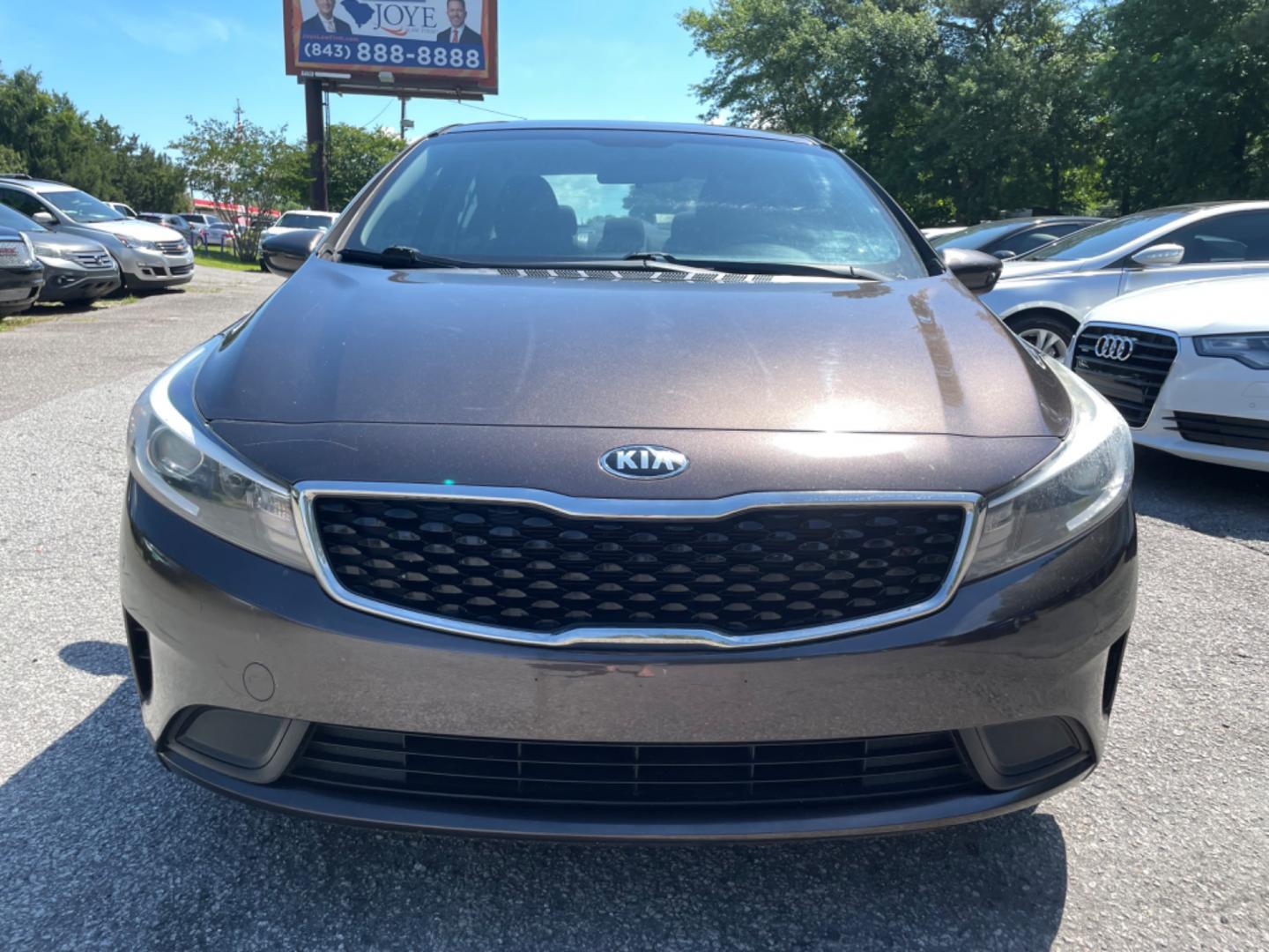 2017 BROWN KIA FORTE LX (3KPFK4A75HE) with an 2.0L engine, automatic transmission, located at 5103 Dorchester Rd., Charleston, SC, 29418-5607, (843) 767-1122, 36.245171, -115.228050 - Photo#1